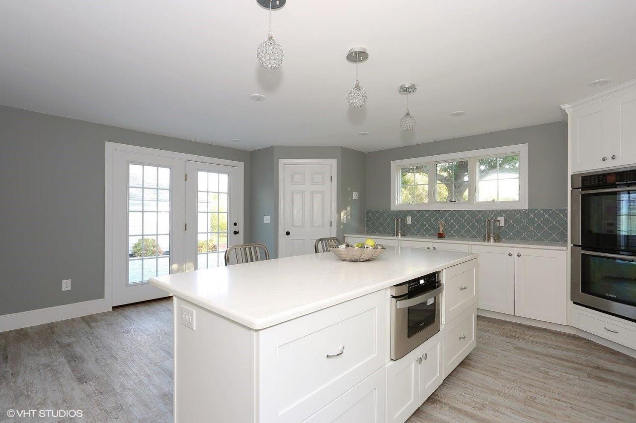 19 Salten Point Road Barnstable, MA 02630 - Photo 7 of 23 a kitchen with a stove a sink and a refrigerator