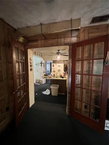 a view of a room with a large window