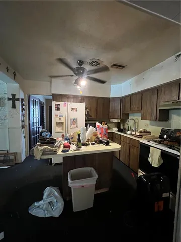 a view of a livingroom with furniture and closet