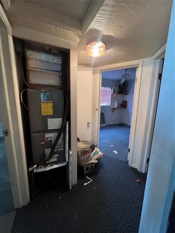 a bathroom with a sink vanity mirror and tub