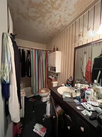 a view of street with large trees