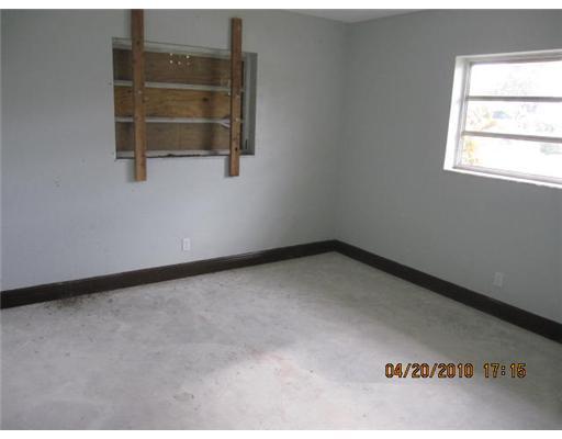 898 Southwest 15th Street Boca Raton, FL 33486 - Photo 11 of 16 a view of an empty room and a window