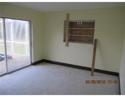898 Southwest 15th Street Boca Raton, FL 33486 - Photo 12 of 16 a view of an empty room and window