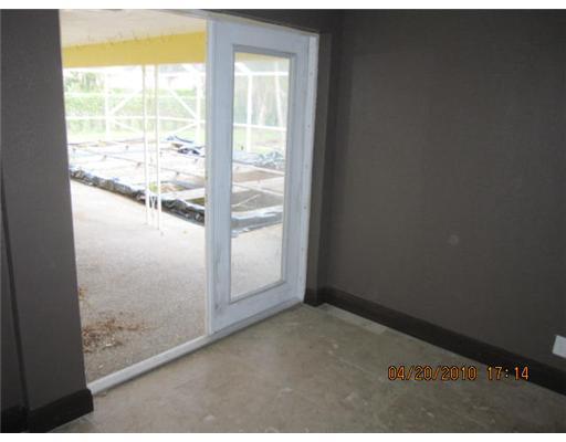 898 Southwest 15th Street Boca Raton, FL 33486 - Photo 6 of 16 a view of an empty room and window