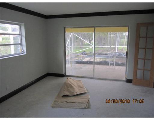 898 Southwest 15th Street Boca Raton, FL 33486 - Photo 7 of 16 a view of an empty room and window