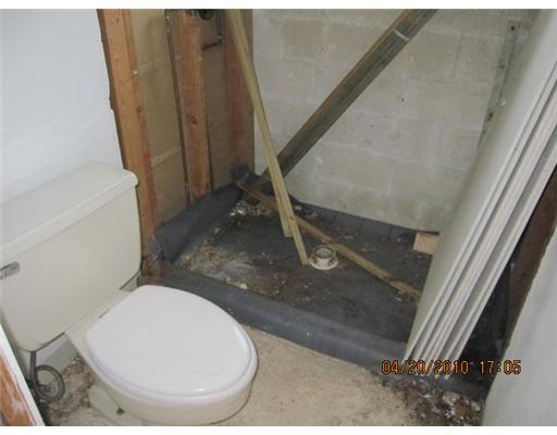 898 Southwest 15th Street Boca Raton, FL 33486 - Photo 8 of 16 a bathroom with a sink and toilet