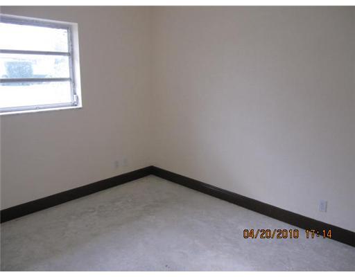 898 Southwest 15th Street Boca Raton, FL 33486 - Photo 9 of 16 a view of an empty room and window