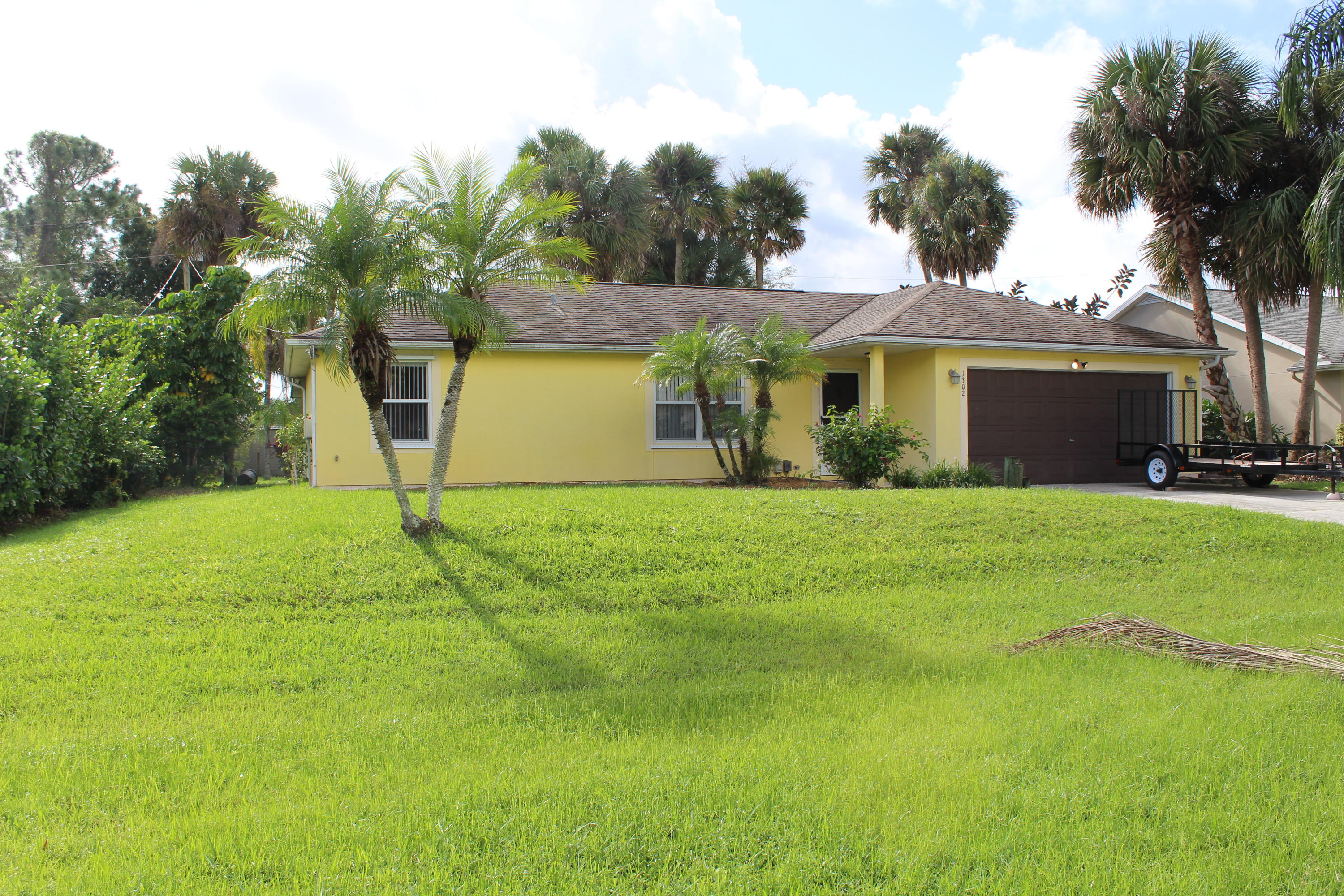 1302 Southwest Porter Road Port St. Lucie, FL 34953 - Photo 1 of 14 Front of house