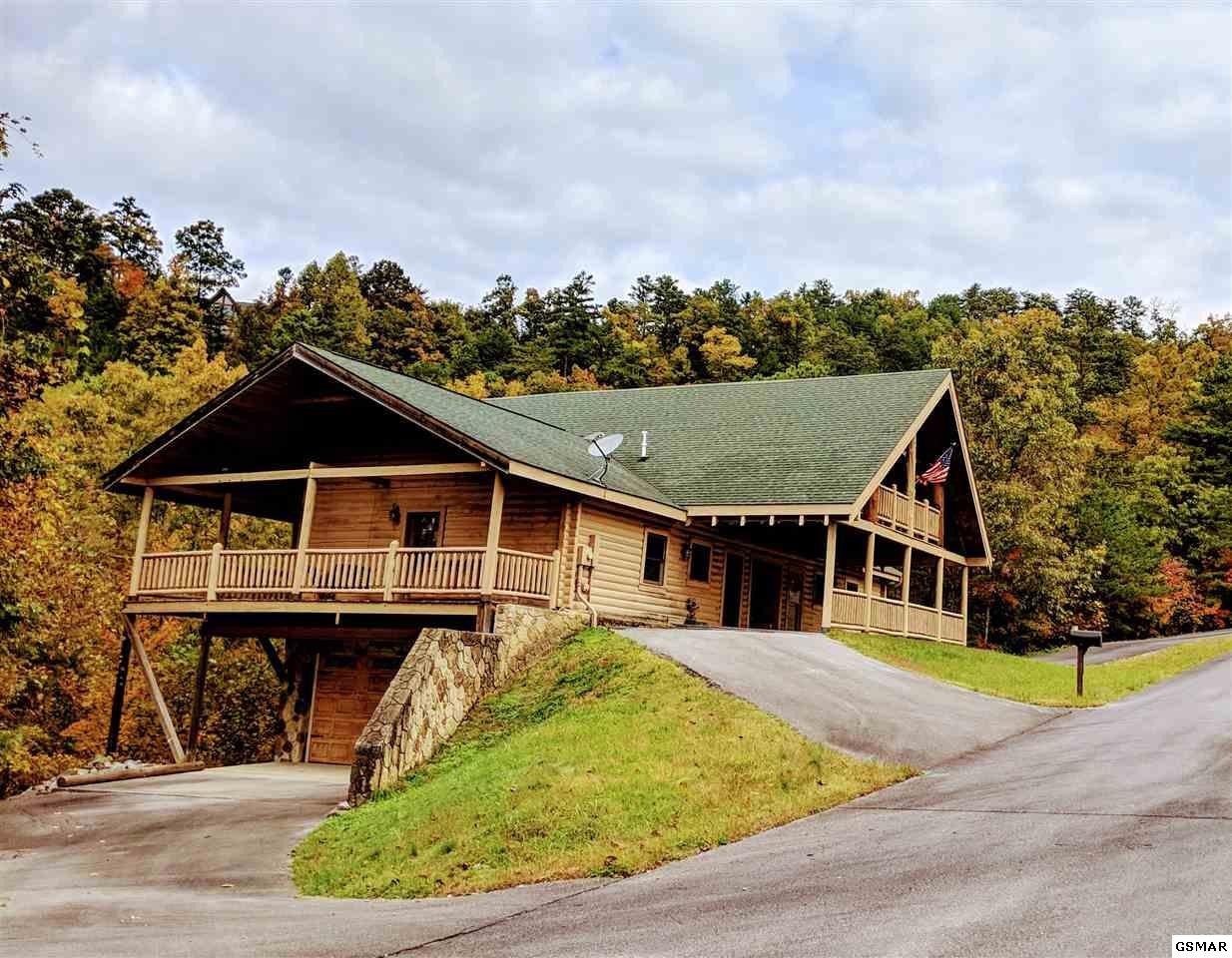 a view of a house next to a yard