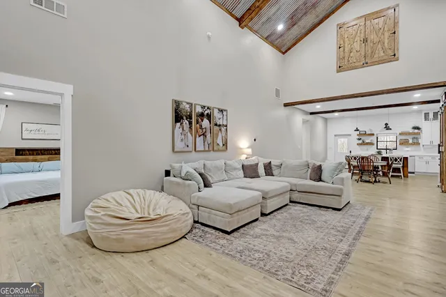 a living room with furniture and window