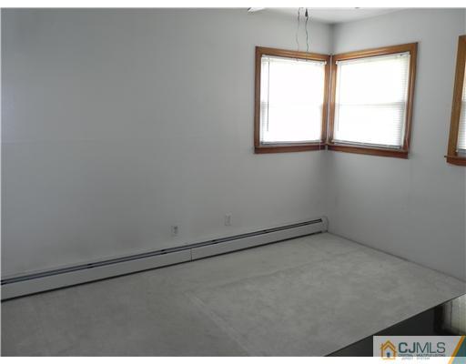 3 Sturgis Road Edison, NJ 08817 - Photo 11 of 17 an empty room with a window
