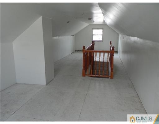 3 Sturgis Road Edison, NJ 08817 - Photo 14 of 17 a view of an entryway and a livingroom