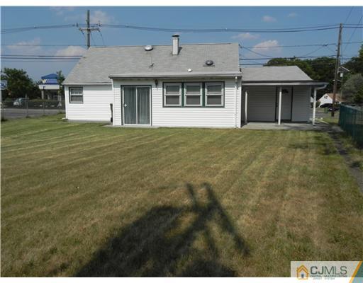 3 Sturgis Road Edison, NJ 08817 - Photo 16 of 17 a front view of a house with a garden