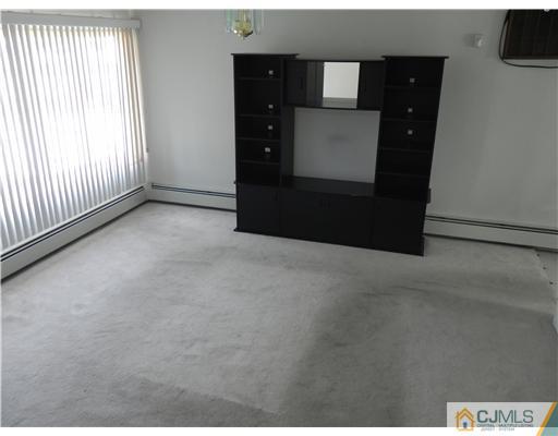 3 Sturgis Road Edison, NJ 08817 - Photo 3 of 17 a view of a windows and an empty room