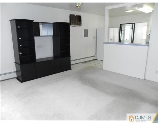 3 Sturgis Road Edison, NJ 08817 - Photo 10 of 17 a view of an empty room with windows