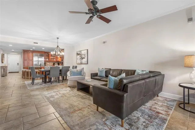 a living room with furniture and a table
