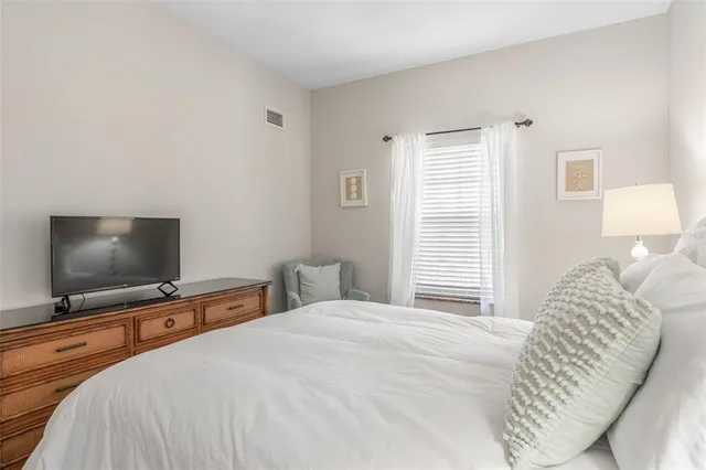 a view of a lake with a city