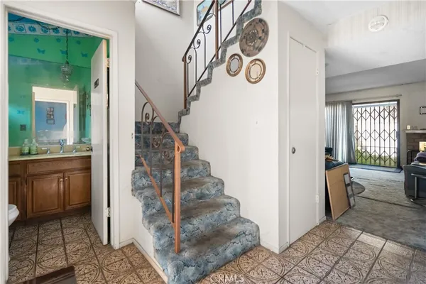 a view of entryway and hall with a window