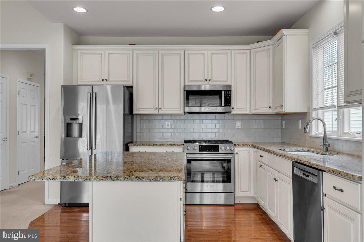 237 Crescent Road Landenberg, PA 19350 - Photo 21 of 46 a kitchen with stainless steel appliances granite countertop a refrigerator sink and cabinets