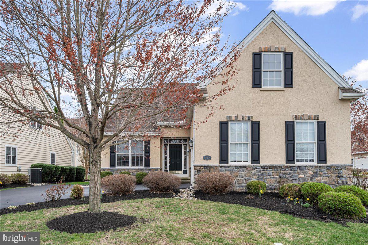 237 Crescent Road Landenberg, PA 19350 - Photo 3 of 46 a front view of a house with a yard and garage