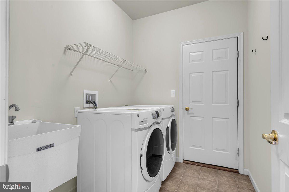 237 Crescent Road Landenberg, PA 19350 - Photo 32 of 46 a utility room with dryer and washer