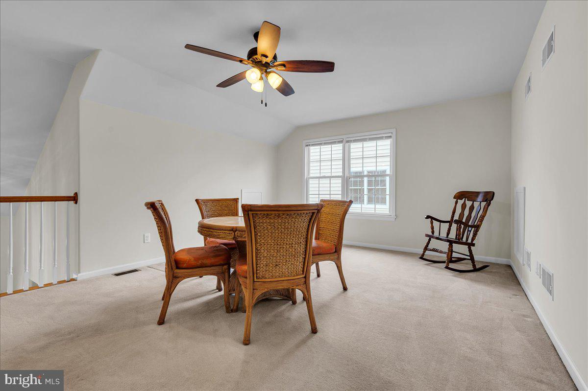 237 Crescent Road Landenberg, PA 19350 - Photo 35 of 46 a view of a dining room with furniture and chandelier