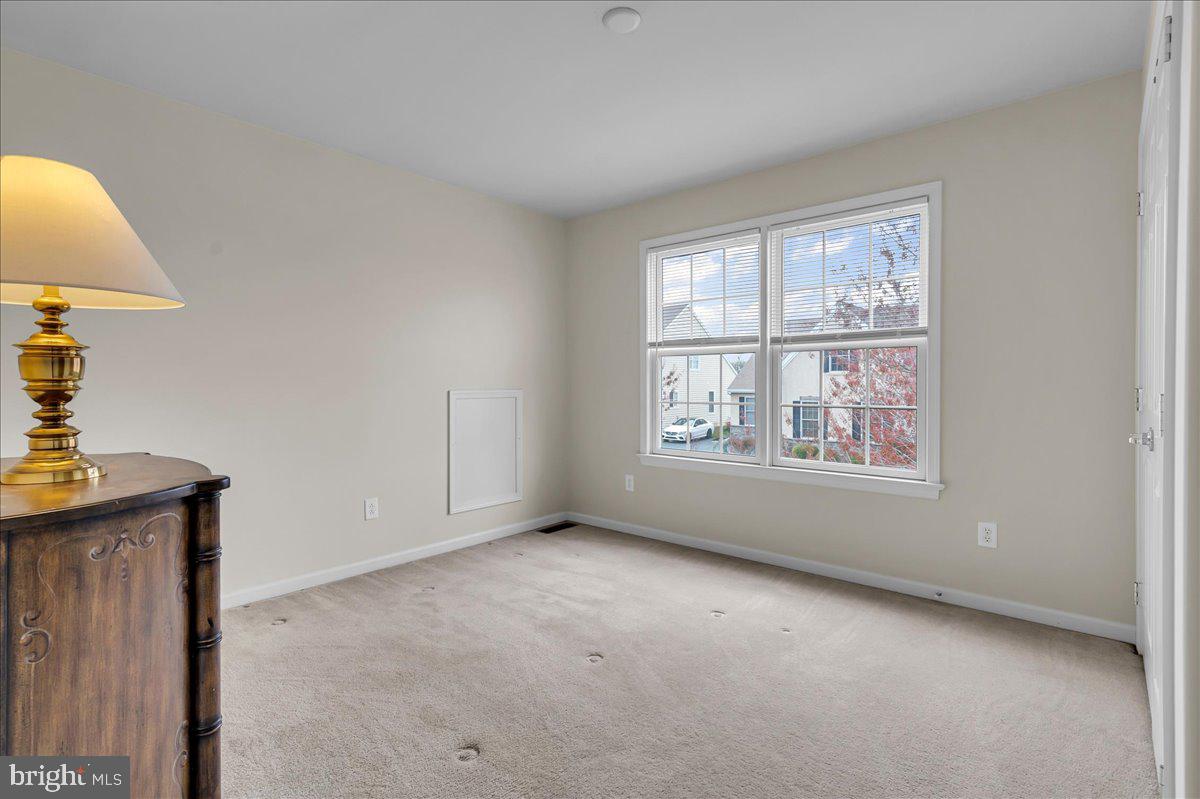 237 Crescent Road Landenberg, PA 19350 - Photo 37 of 46 a view of an empty room with a window