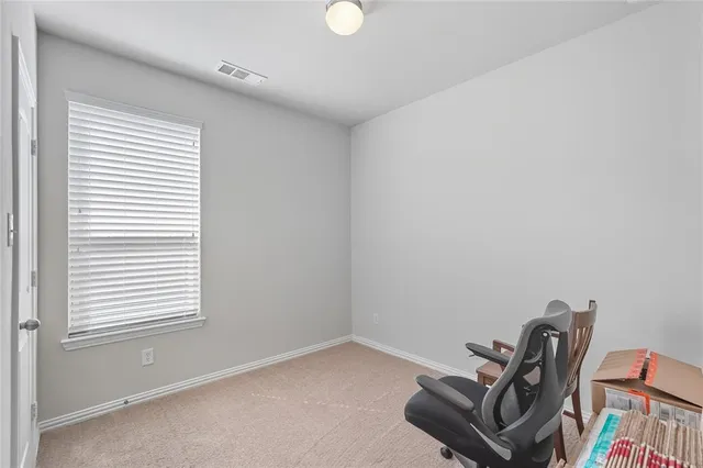 a room with furniture and a window