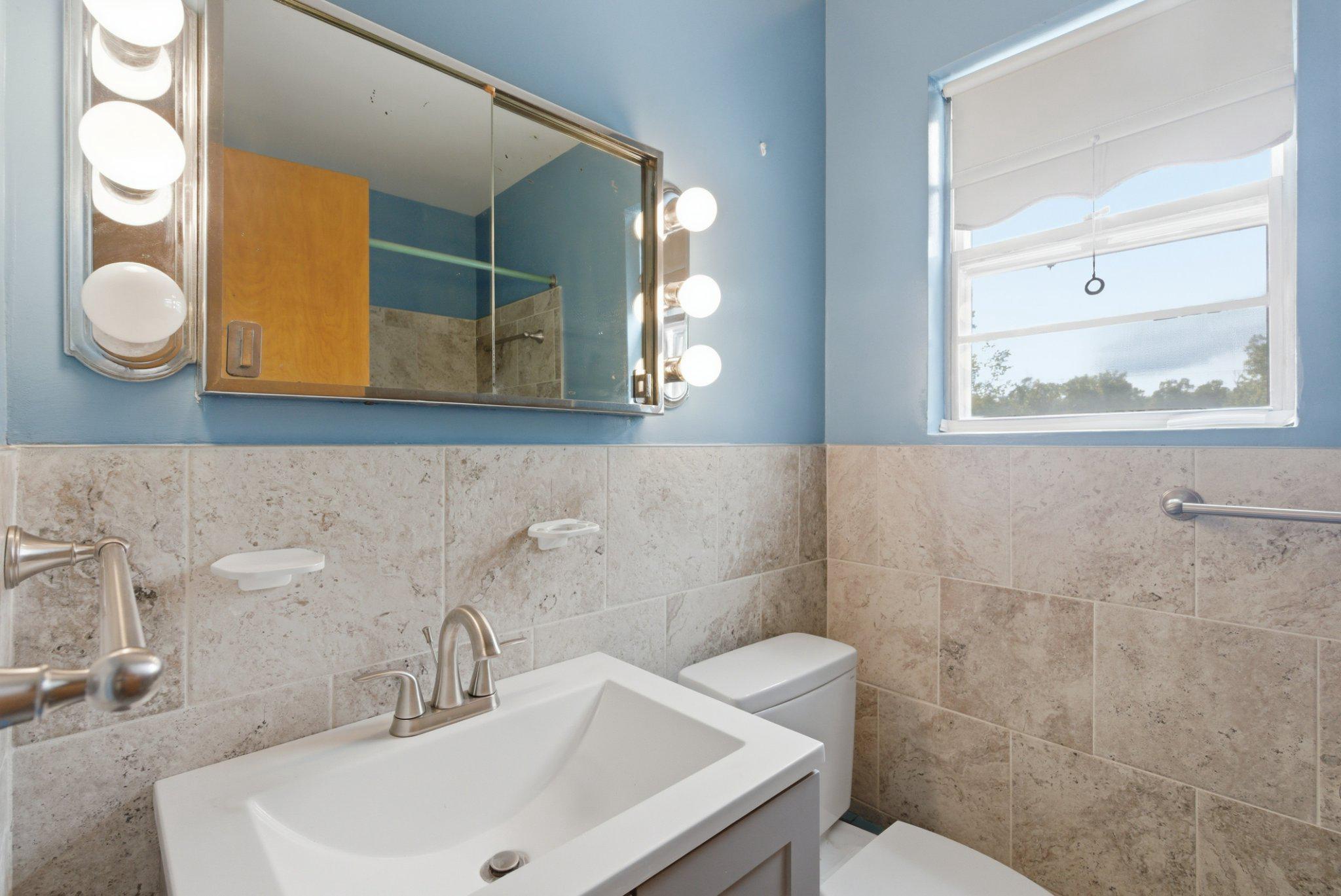 1110 Chillum Manor Road Hyattsville, MD 20783 - Photo 12 of 30 Full bathroom with vanityand tub.