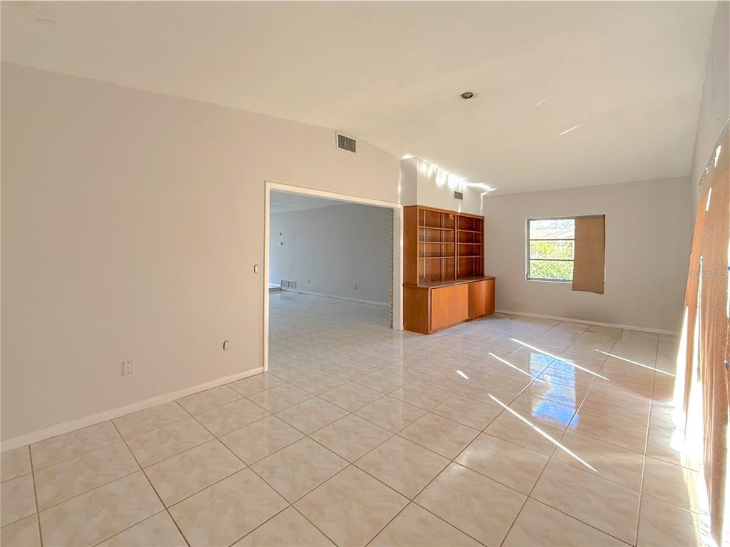 2464 Derbyshire Road Maitland, FL 32751 - Photo 13 of 42 a view of entryway with window and stairs