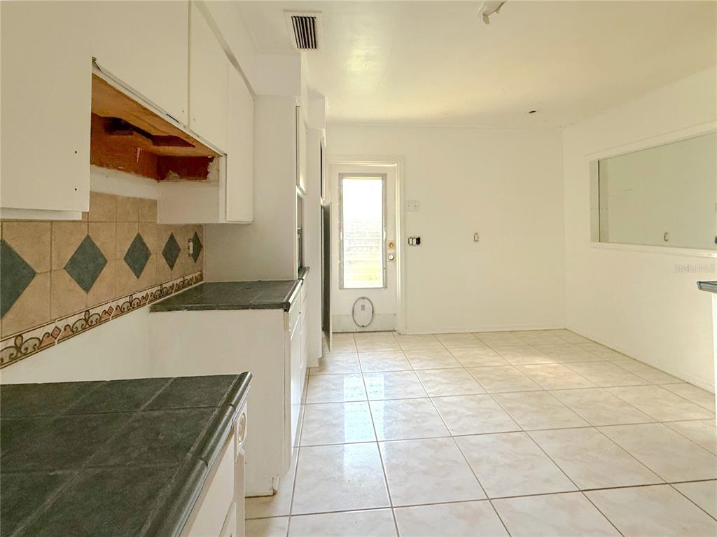 2464 Derbyshire Road Maitland, FL 32751 - Photo 16 of 42 a view of a kitchen cabinets