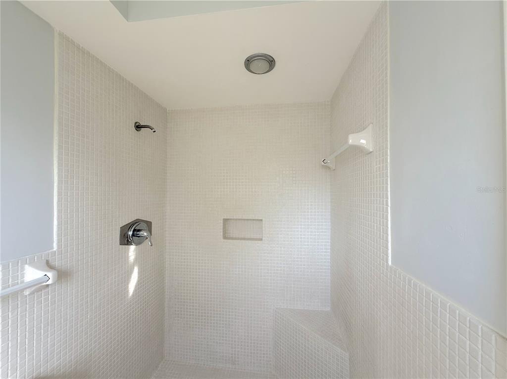 2464 Derbyshire Road Maitland, FL 32751 - Photo 28 of 42 a bathroom with a shower