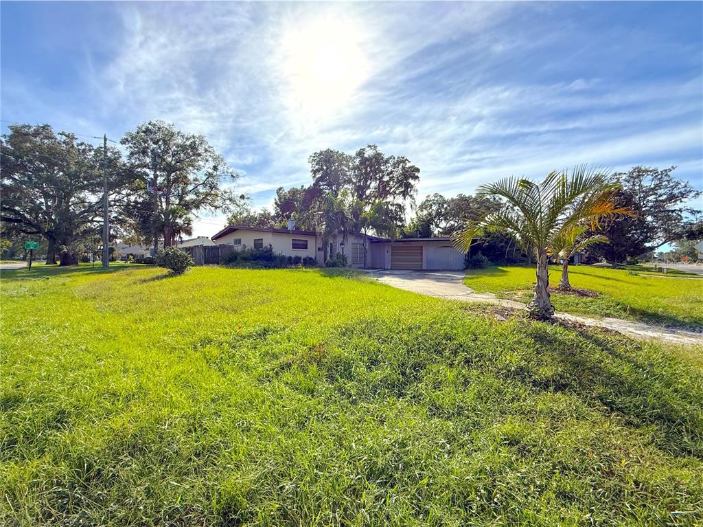 2464 Derbyshire Road Maitland, FL 32751 - Photo 3 of 42 a view of a swimming pool with an outdoor space and seating area