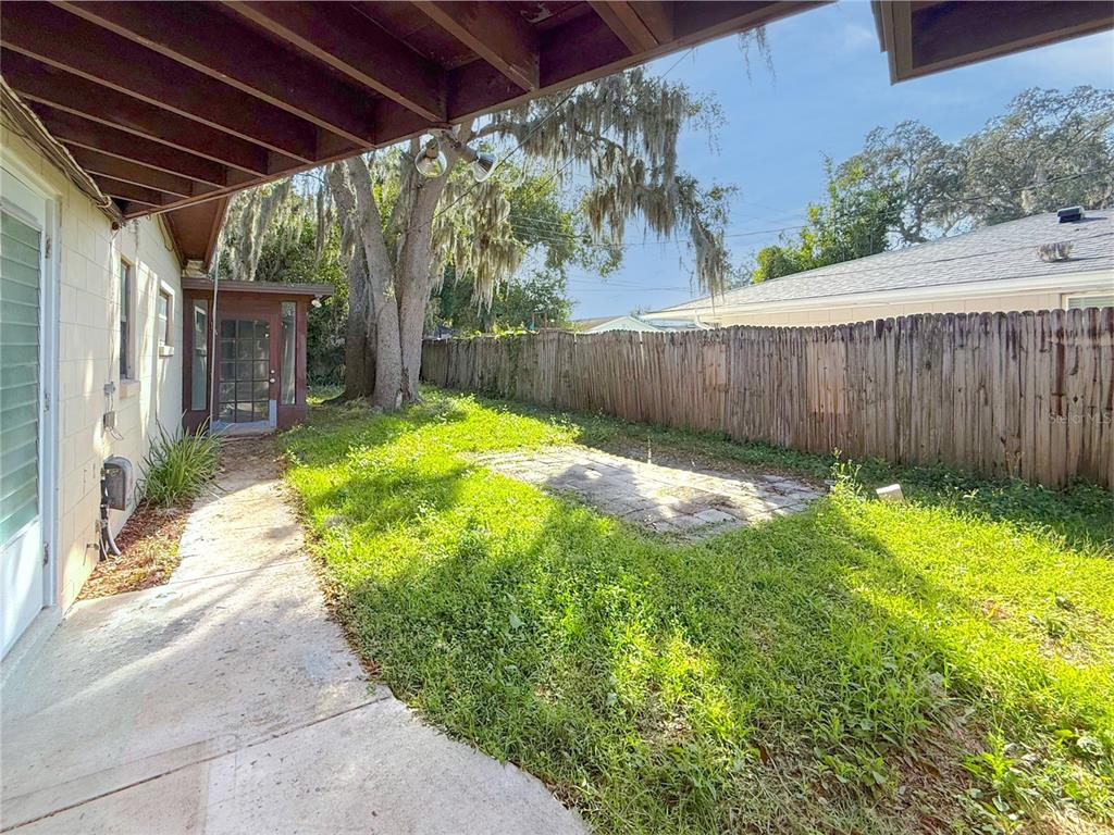 2464 Derbyshire Road Maitland, FL 32751 - Photo 37 of 42 a view of a backyard with wooden fence