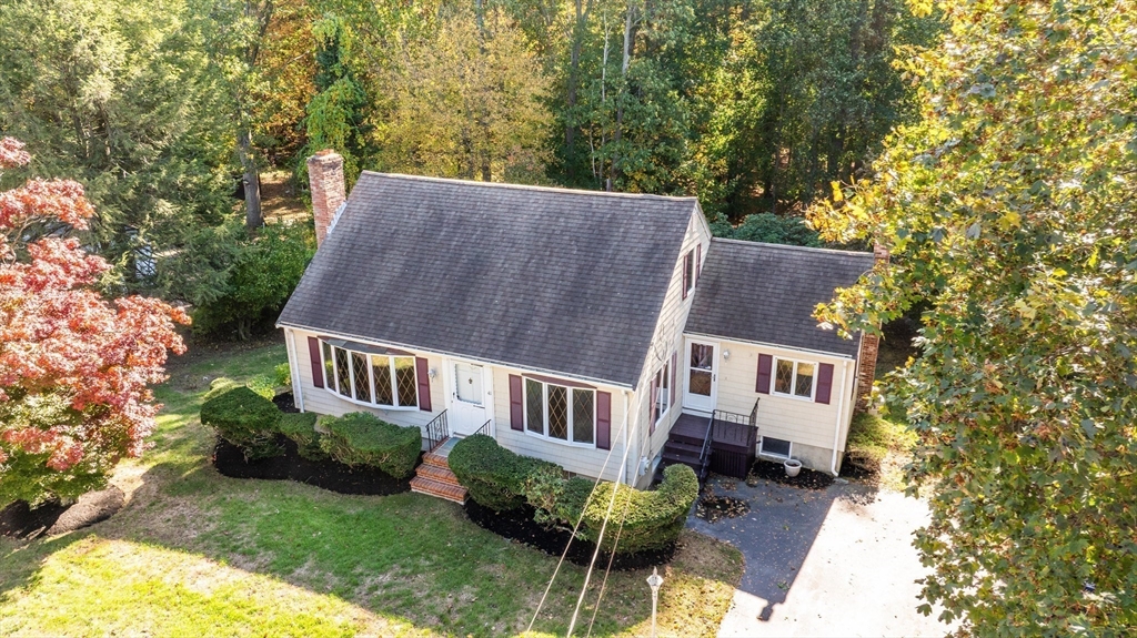 41 Marcus Road Wilmington, MA 01887 - Photo 26 of 29 a view of a house with backyard and sitting area