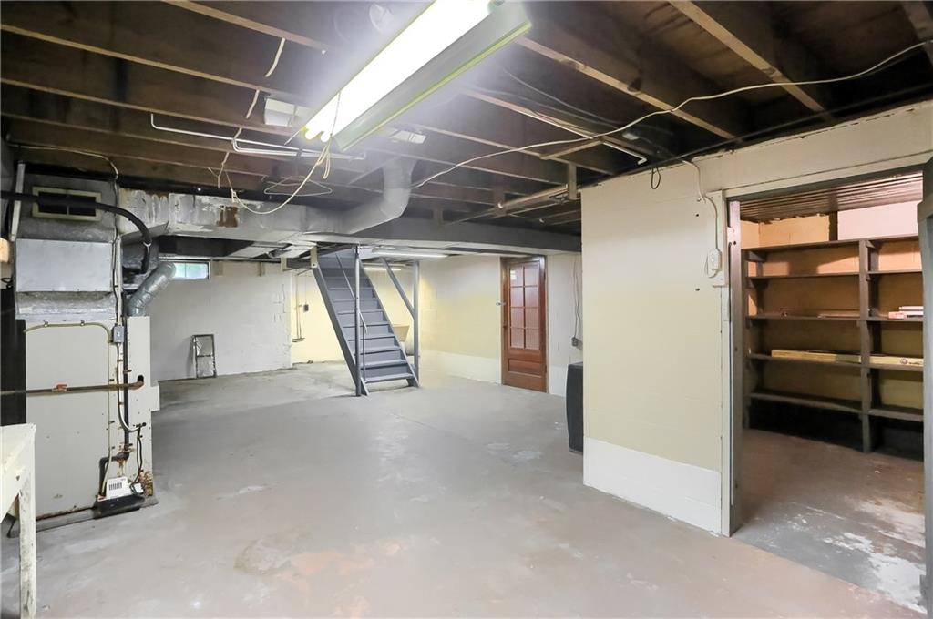 814 Marshall Road Monaca, PA 15061 - Photo 16 of 25 Basement with storage room to right door to garage upper right
