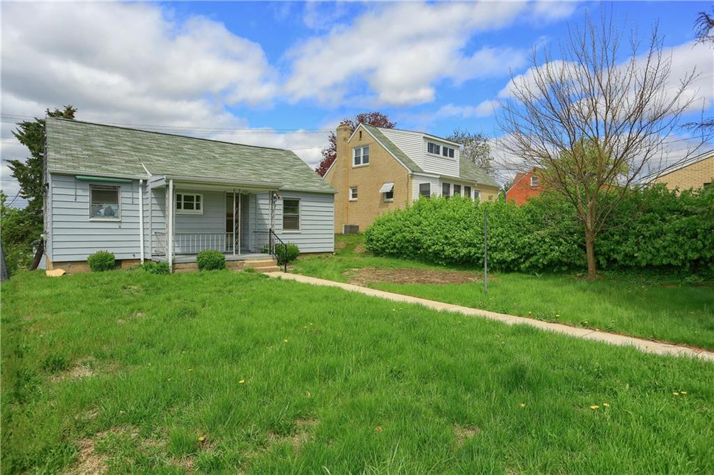 814 Marshall Road Monaca, PA 15061 - Photo 3 of 25 Rear yard sidewalk from driveway and back porch-recently painted