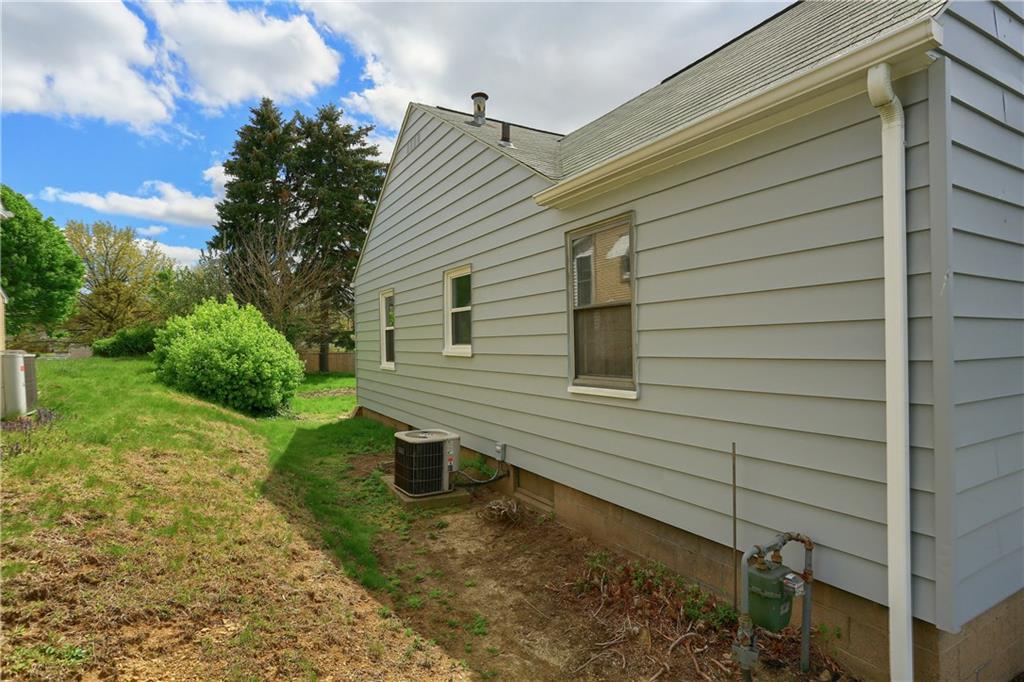 814 Marshall Road Monaca, PA 15061 - Photo 22 of 25 Side of house and AC and gas meter