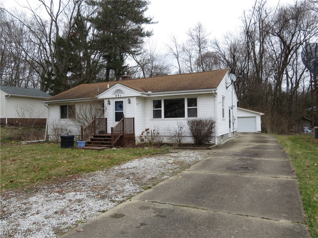 641 Schocalog Road Akron, OH 44320 - Photo 2 of 33 View of front of home featuring a garage