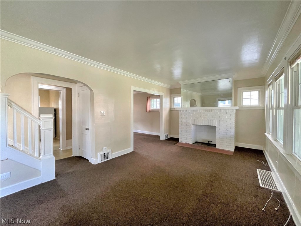 2104 Rossmoor Road Cleveland Heights, OH 44118 - Photo 13 of 35 Living Room with crown molding and newer windows.