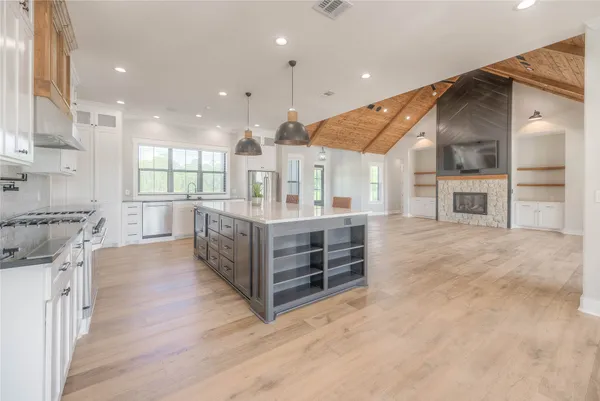 a bathroom with a sink double vanity and a tub