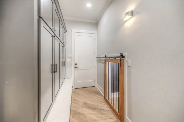 a view of a hallway with a dining area