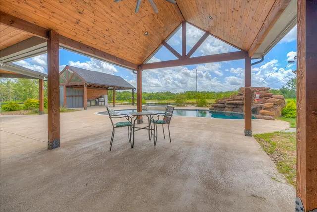 a view of a swimming pool and outdoor space