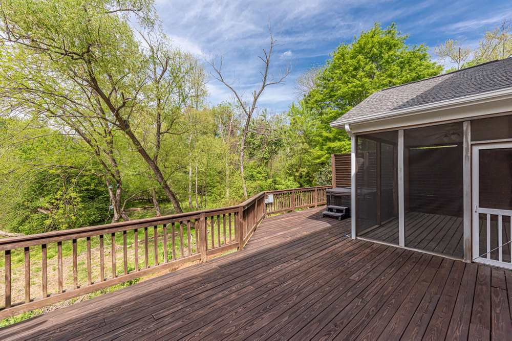 3105 Hummer Way Raleigh, NC 27614 - Photo 27 of 30 Screen porch off Kitchen with extra deck space behind perget for hot tub! Screen Porch and Deck