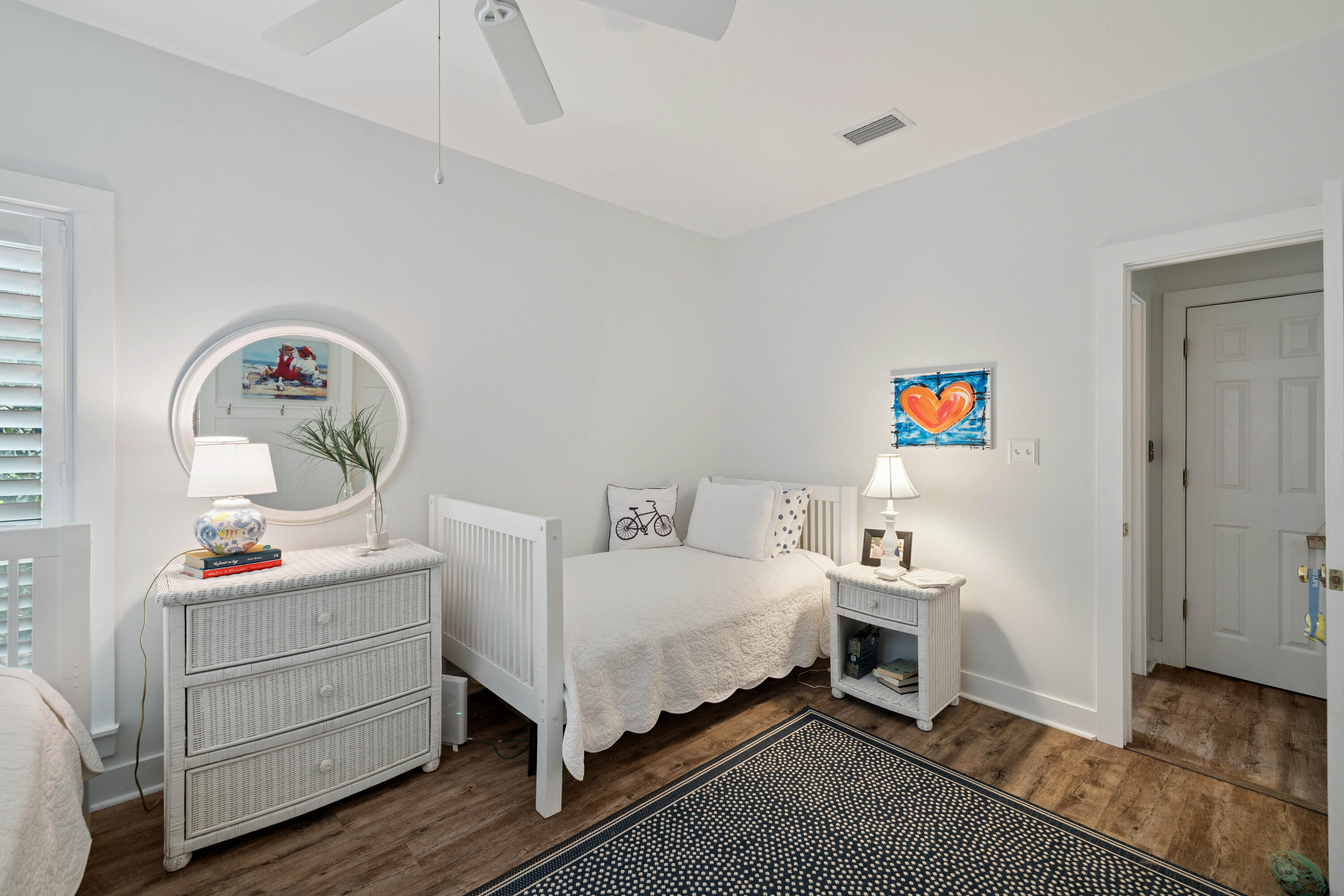 298 Cullman Avenue Santa Rosa Beach, FL 32459 - Photo 22 of 63 a bedroom with a bed and wooden floor