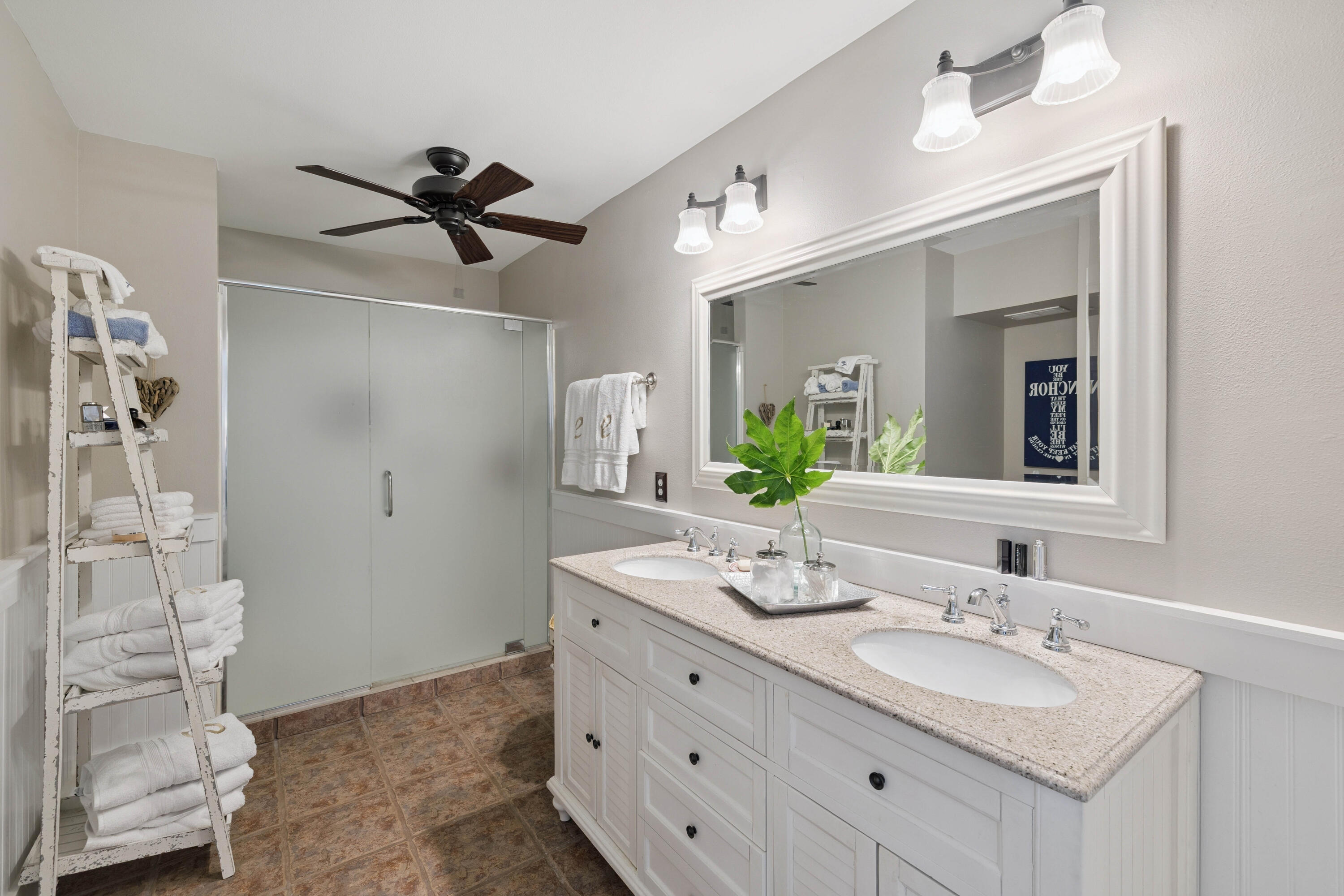 298 Cullman Avenue Santa Rosa Beach, FL 32459 - Photo 25 of 63 a bathroom with a double vanity sink mirror and shower