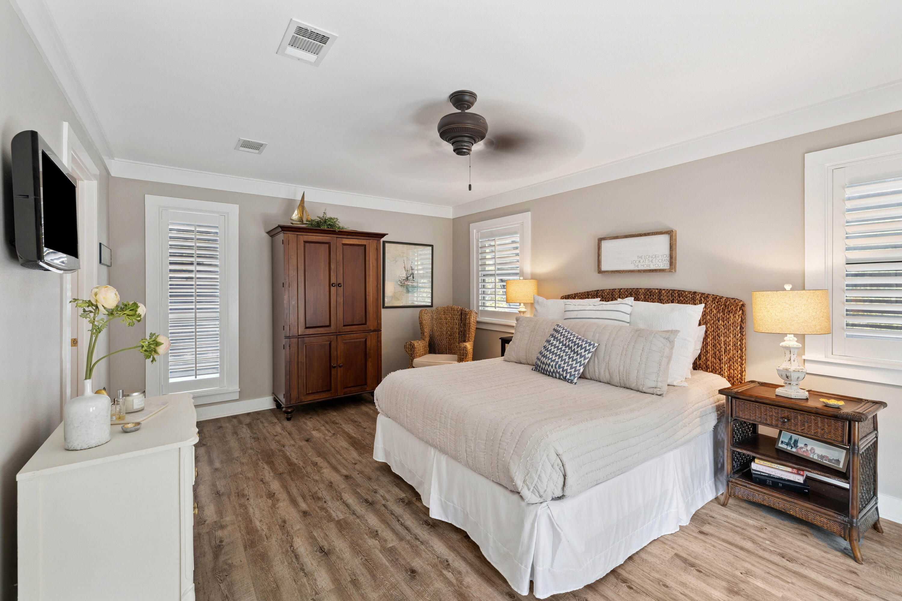 298 Cullman Avenue Santa Rosa Beach, FL 32459 - Photo 26 of 63 a bedroom with a bed and a flat tv screen on dresser