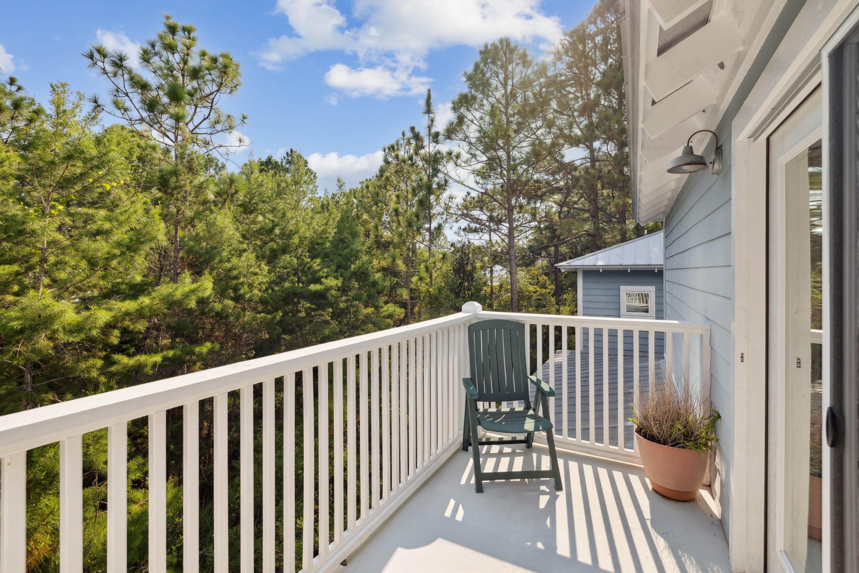 298 Cullman Avenue Santa Rosa Beach, FL 32459 - Photo 28 of 63 a view of balcony with wooden floor and outdoor seating