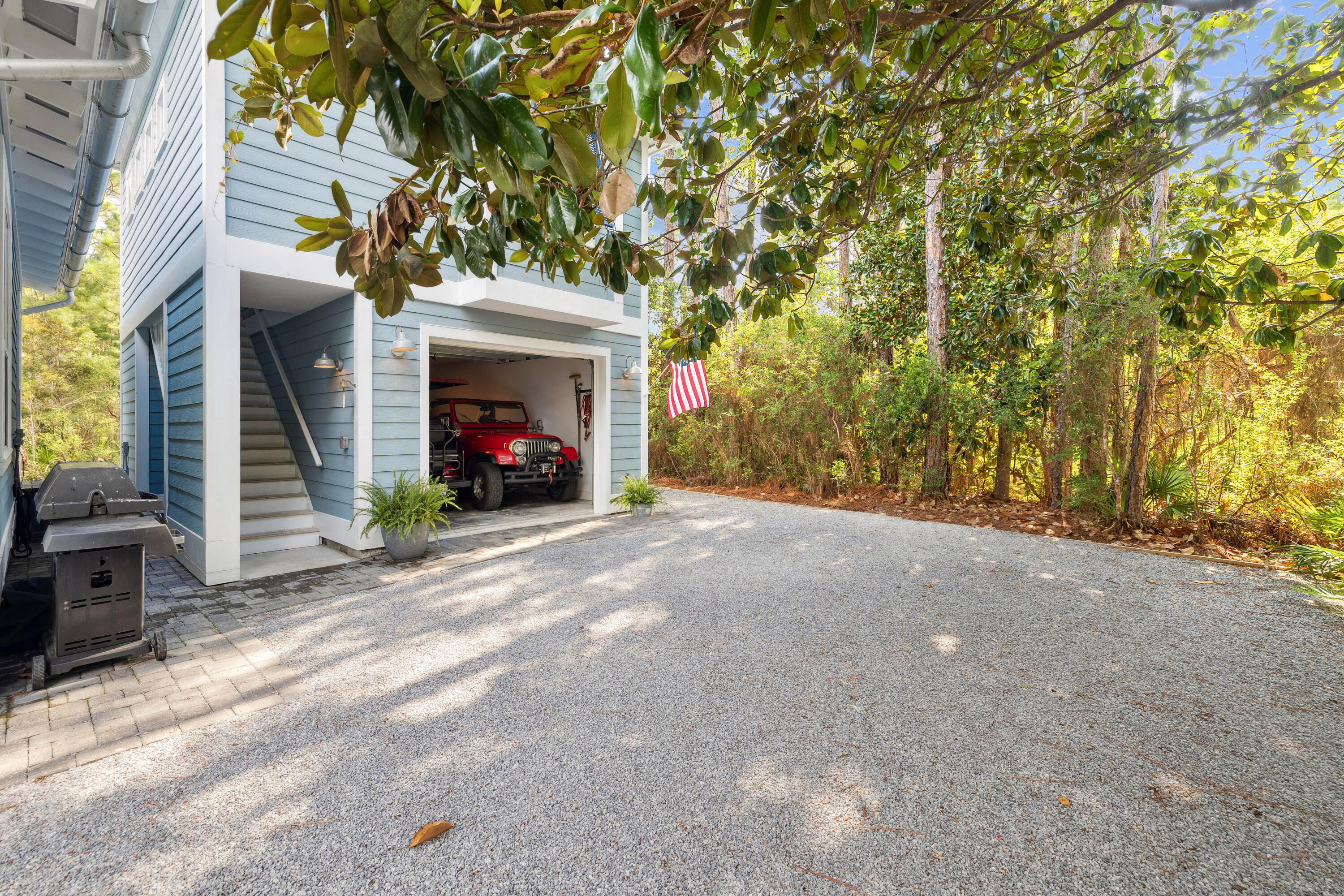 298 Cullman Avenue Santa Rosa Beach, FL 32459 - Photo 32 of 63 a view of a house with a tree and a yard