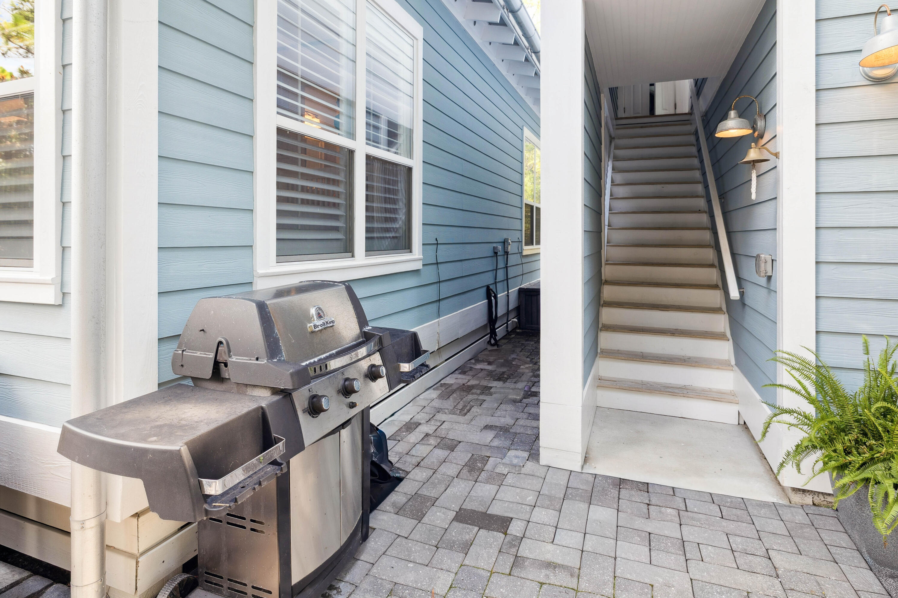 298 Cullman Avenue Santa Rosa Beach, FL 32459 - Photo 37 of 63 a view of a patio with chairs and a potted plant